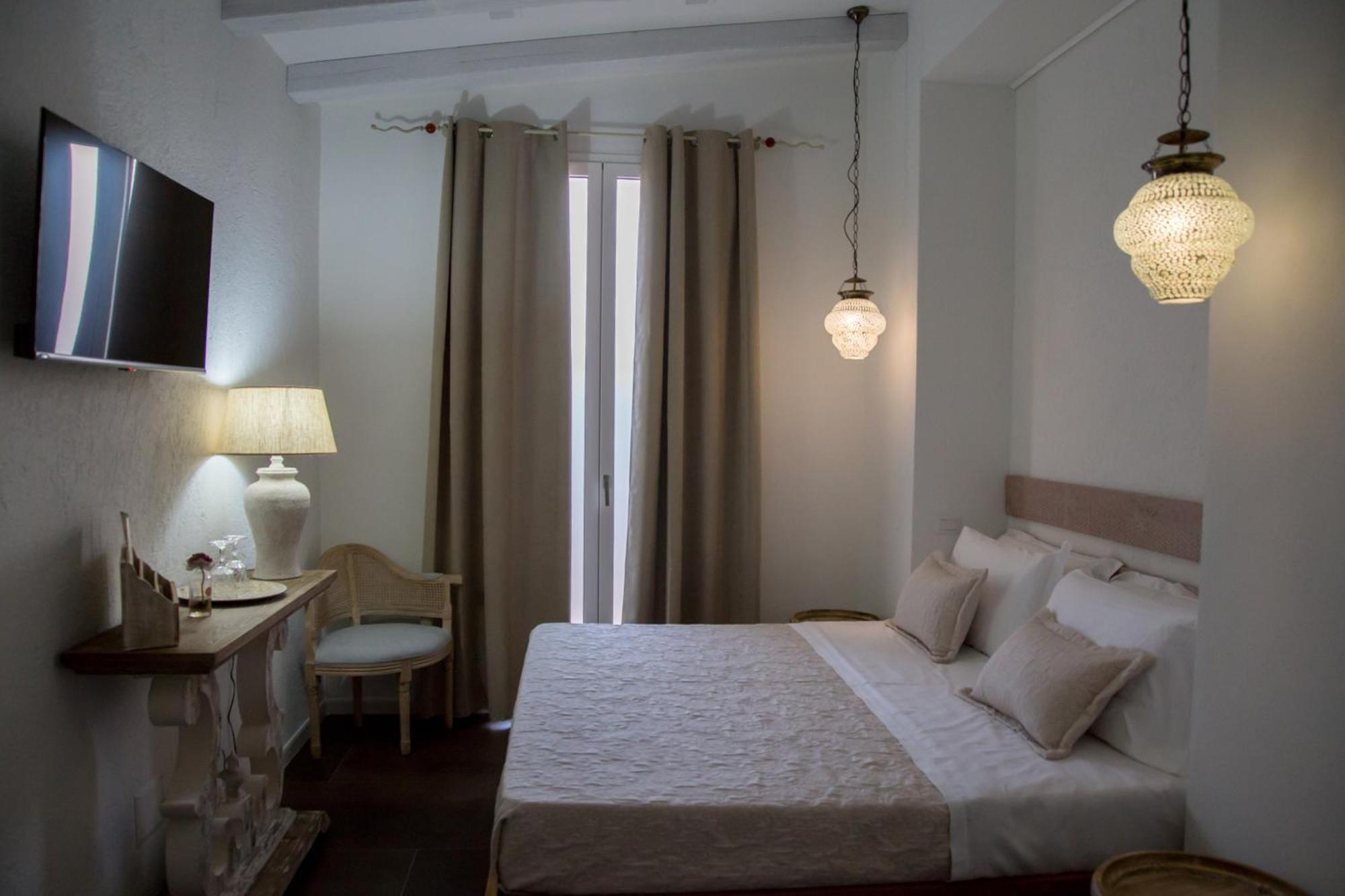 Amelia Apts & Casa de hóspedes Alghero