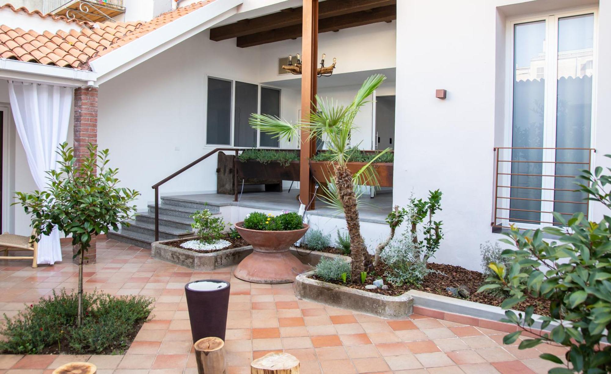 Amelia Apts & Casa de hóspedes *